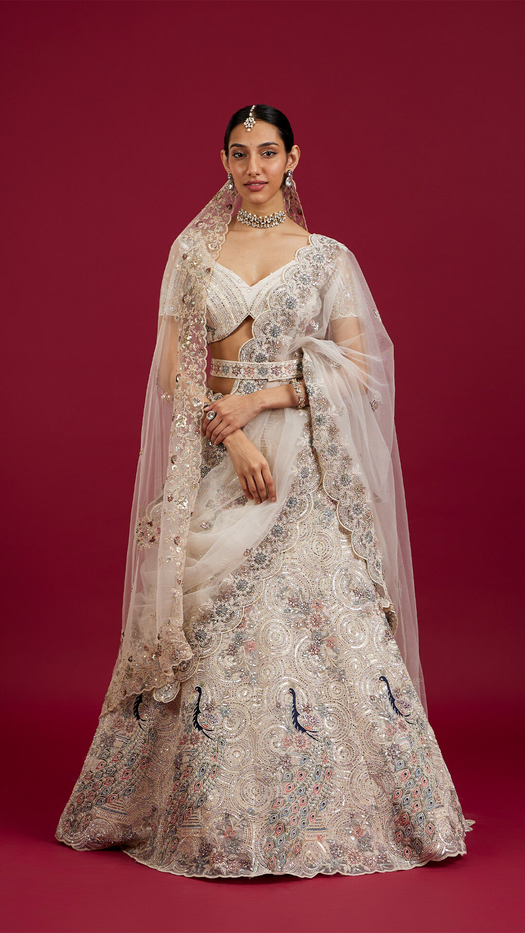 A bride with white bridal lehenga on her wedding